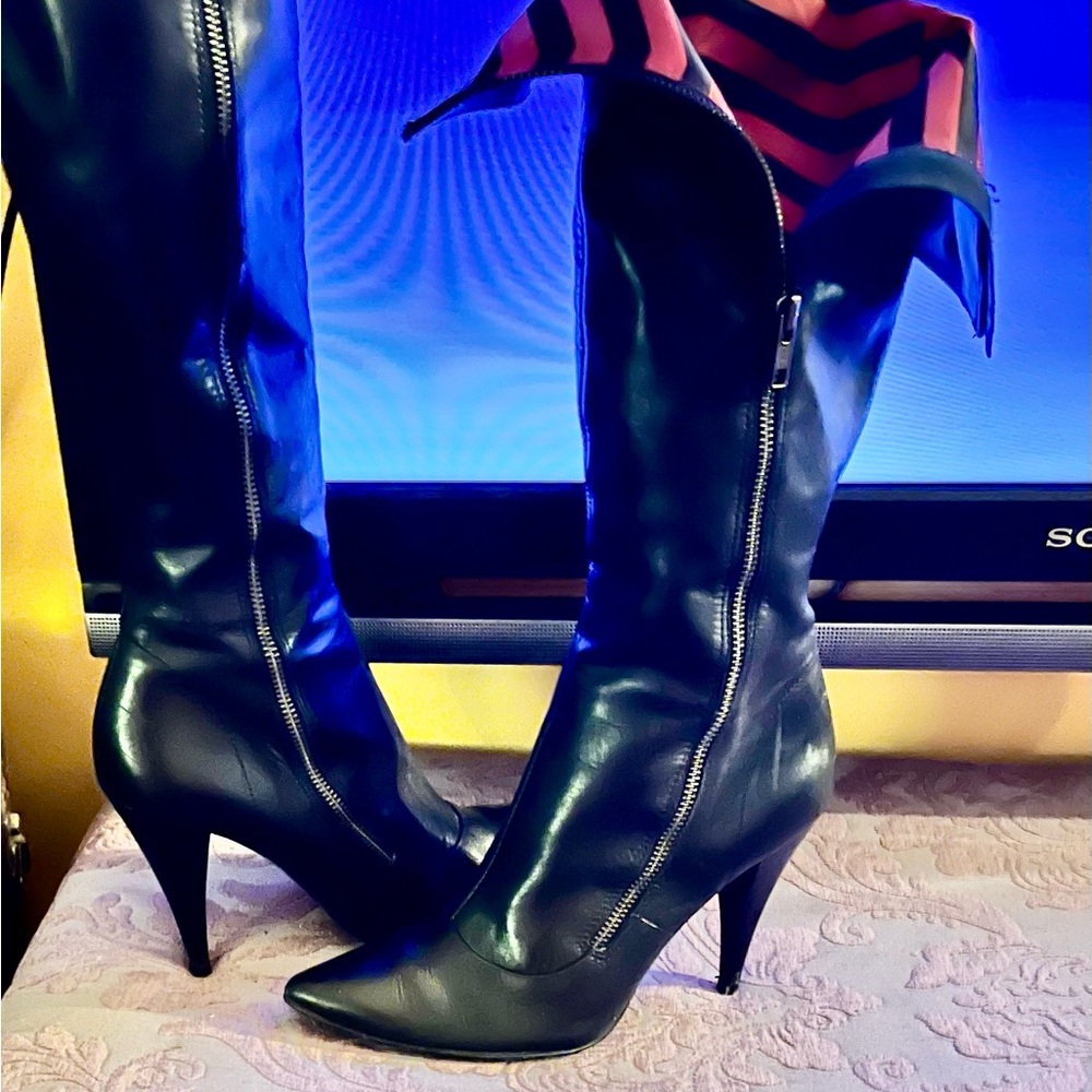 Sleek Black Leather Heeled Boots